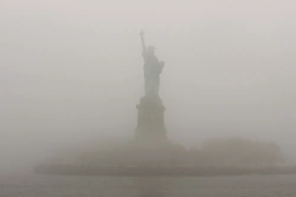 Statue of Liberty in the fog, New York
